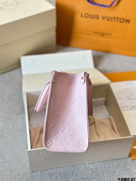 Louis Vuitton pink OTG handbag