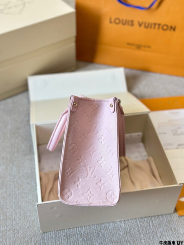 Louis Vuitton pink OTG handbag