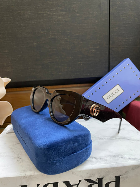 Guci glasses